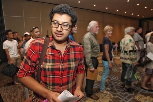Francis Cortez talks about his hope to be an extra after making it through to the casting table. Way over 2,000 hopeful extras stood in line during a casting call at Fairmont Sunday for a movie starring Dennis Quaid, Peggy Lipton and Britt Robertson. 150809 August 09, 2015 MIKE DEAL / WINNIPEG FREE PRESS
