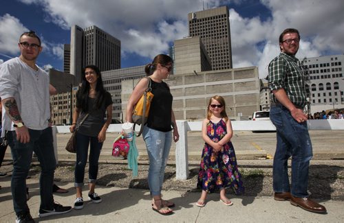 Charlotte Alderson, 6, with her mom, Emily (centre), close to the end of the line during the casting call at the Fairmont Sunday for a movie starring Dennis Quaid, Peggy Lipton and Britt Robertson. 150809 August 09, 2015 MIKE DEAL / WINNIPEG FREE PRESS