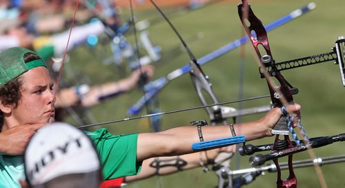 Hayden Edwards from Toronto takes aim during an elimination round of the Canada Open at the Canadian Archery Championships in Winnipeg. Over two hundred competitors from across the country took part in the championship which finished Sunday.  150809 August 09, 2015 MIKE DEAL / WINNIPEG FREE PRESS
