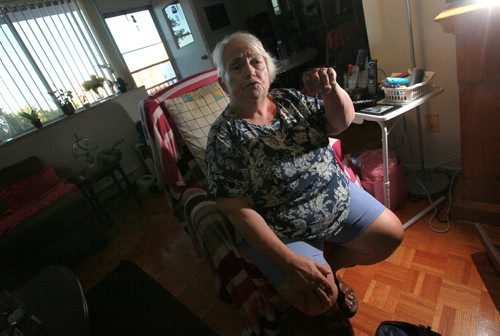 Christiane Leroux - grandmother who was knocked out with the butt end of a shotgun in a 2013 assault recalls the incident that happened in the parking garage where she was found unconcious after thieves stole her car. See Mike MacIntyre story. August 10, 2015 - (Phil Hossack / Winnipeg Free Press)