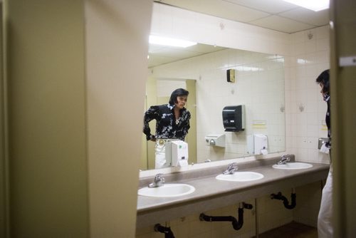 Elvis impersonator Corny Rempel transforms from his regular self to his stage persona through makeup, a wig, and classic outfits at a show at the Elvis Festival in Gimli on Sunday, Aug. 9, 2015. Mikaela MacKenzie / Winnipeg Free Press
