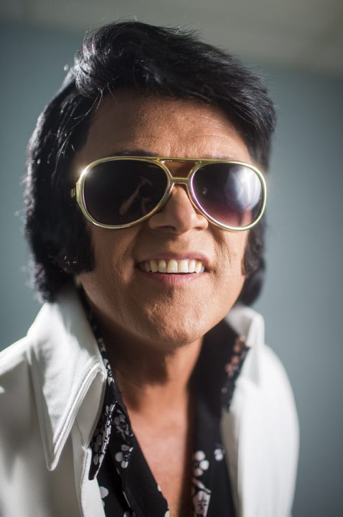 Elvis impersonator Corny Rempel transforms from his regular self to his stage persona through makeup, a wig, and classic outfits at a show at the Elvis Festival in Gimli on Sunday, Aug. 9, 2015. Mikaela MacKenzie / Winnipeg Free Press