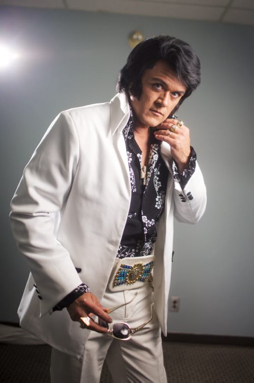 Elvis impersonator Corny Rempel transforms from his regular self to his stage persona through makeup, a wig, and classic outfits at a show at the Elvis Festival in Gimli on Sunday, Aug. 9, 2015. Mikaela MacKenzie / Winnipeg Free Press