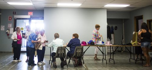 Elvis impersonator Corny Rempel transforms from his regular self to his stage persona through makeup, a wig, and classic outfits at a show at the Elvis Festival in Gimli on Sunday, Aug. 9, 2015. Mikaela MacKenzie / Winnipeg Free Press