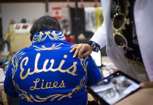 Elvis impersonator Corny Rempel transforms from his regular self to his stage persona through makeup, a wig, and classic outfits at a show at the Elvis Festival in Gimli on Sunday, Aug. 9, 2015.   Mikaela MacKenzie / Winnipeg Free Press