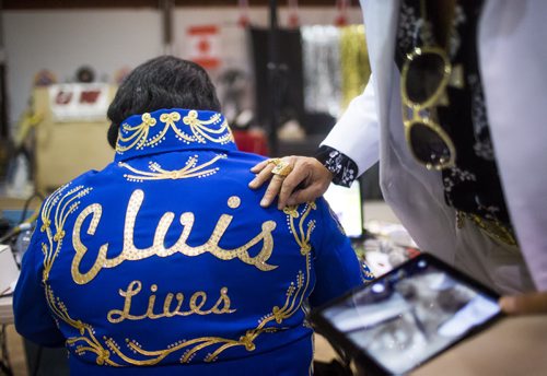 Elvis impersonator Corny Rempel transforms from his regular self to his stage persona through makeup, a wig, and classic outfits at a show at the Elvis Festival in Gimli on Sunday, Aug. 9, 2015. Mikaela MacKenzie / Winnipeg Free Press