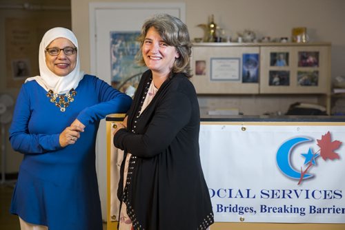 Shahina Siddiqui (left) and Irene McConachy of the Islamic Social Services Association support voting in Winnipeg on Tuesday, Aug. 11, 2015.   Mikaela MacKenzie / Winnipeg Free Press