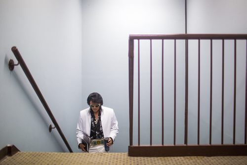 Elvis impersonator Corny Rempel transforms from his regular self to his stage persona through makeup, a wig, and classic outfits at a show at the Elvis Festival in Gimli on Sunday, Aug. 9, 2015. Mikaela MacKenzie / Winnipeg Free Press