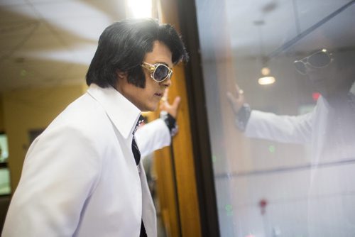 Elvis impersonator Corny Rempel transforms from his regular self to his stage persona through makeup, a wig, and classic outfits at a show at the Elvis Festival in Gimli on Sunday, Aug. 9, 2015. Mikaela MacKenzie / Winnipeg Free Press