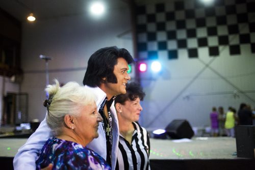 Elvis impersonator Corny Rempel interacts with fans at the Elvis Festival in Gimli on Sunday, Aug. 9, 2015.   Mikaela MacKenzie / Winnipeg Free Press