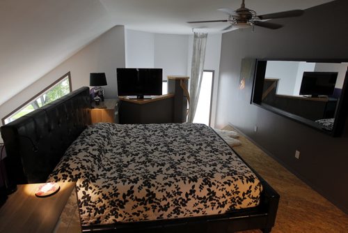 HOMES - 579 Carlaw Avenue in Fort Rouge (off Osborne Street) Realtor Tom Blumberg. Master bedroom. BORIS MINKEVICH / WINNIPEG FREE PRESS PHOTO August 11, 2015