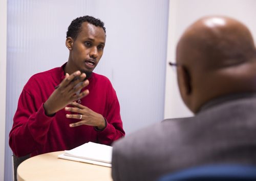 Yahya Samatar at the Welcome Place in Winnipeg on Wednesday, Aug. 12, 2015.  Samatar has spent much of the last few days filling out many complex documents with help from staff.   Mikaela MacKenzie / Winnipeg Free Press