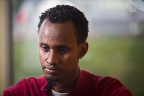 Yahya Samatar at the Welcome Place in Winnipeg on Wednesday, Aug. 12, 2015.  Samatar has spent much of the last few days filling out many complex documents with help from staff.   Mikaela MacKenzie / Winnipeg Free Press