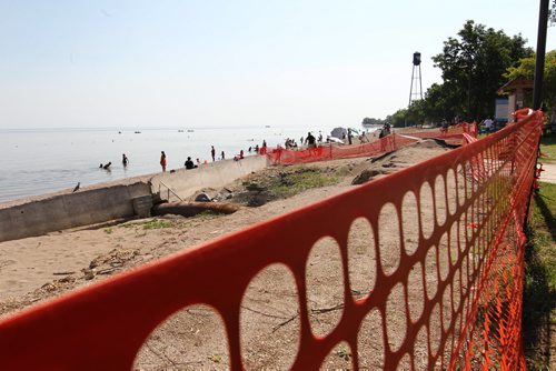 Photo taken Thursday of a portion of Wpg Beach which is still baracaded  and  off-limits to visitors since a storm in May caused it to be unsafe.  Manitoba Premier Greg Selinger and Wpg Beach Mayor Tony Pimente announced new funding to repair a seawall along this portion of the beach at a press conference Thursday.  TOPIC: New funding for seawall repairs in Winnipeg Beach