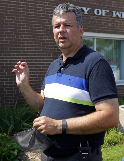 Ken Nawolsky, City of Winnipeg superintendent of insect control, does an update on testing results on DeltaGard, a new organic treatment to replace malathion. Photo taken at Public works yard, 1539 Waverley. He holds a test cage that weill be used in the trials of the product as early as next week. BORIS MINKEVICH / WINNIPEG FREE PRESS PHOTO August 13, 2015