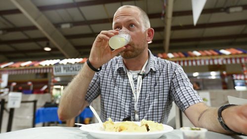 Ben Macphee-Sigurdson drinks a Pisco Sour at the Chilean Pavilion, the third stop of his Folklorama drinks tour. AKA Ben's Global Bender. August 13, 2015 - Melissa Tait / Winnipeg Free Press