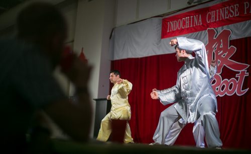 Ben Macphee-Sigurdson watches a Tai Chi performance at the Indochina Pavilion on the fourth stop of his Folklorama drinks tour. AKA Ben's Global Bender. August 12, 2015 - Melissa Tait / Winnipeg Free Press