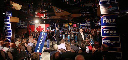 Prime Minister STEPHEN HARPER (center) at a party rally held in Winnipeg Thursday afternoon. About 200 party faithful packed a small room at a local hotel. There were no public attndees. See story. August 13,2015 - (Phil Hossack / Winnipeg Free Press)