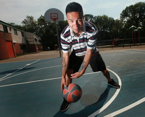 Leonard Monkman,dribbles a basketball on the outdoor courts at Elias Magnusson Community Center Friday. See Melessa Matin's story. August 14, 2015 - (Phil Hossack / Winnipeg Free Press)