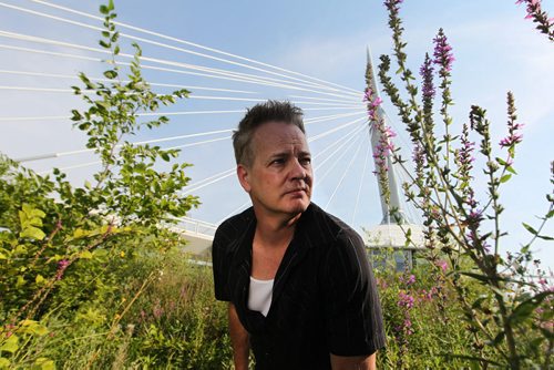 Artist Charlie Johnston describes his vision behind the statue of Faron Hall that he is commissioned to build Friday at the very site that it will be erected, on the banks of the Red River near the Esplanade Riel Bridge. See Gordon Sinclair story.  Aug 14, 2015 Ruth Bonneville / Winnipeg Free Press