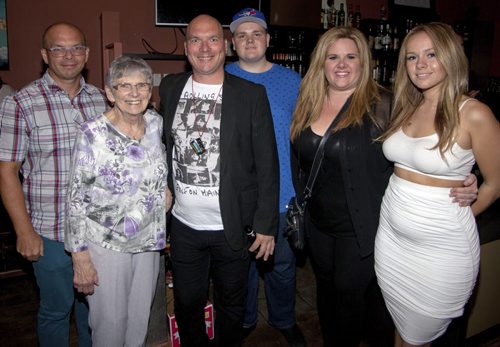 A surprise 50th birthday party for POP Sports & Entertainments Dave Sherman was held Aug. 7, 2015 at Le Garage Café. Pictured, from left, are Peter Sherman, Ellen Sherman, Dave Sherman, Jordan Lamirande, Angie Lamirande and Brittney Lamirande. (JOHN JOHNSTON / WINNIPEG FREE PRESS)