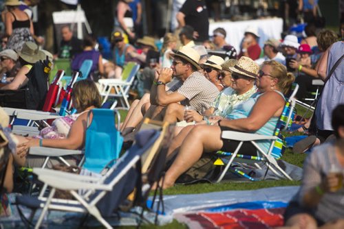 The crowd watches Hawksley Workman play at the Interstellar Rodeo at the Forks in Winnipeg on Friday, Aug. 14, 2015.   Mikaela MacKenzie / Winnipeg Free Press