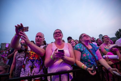 Fans watch Sarah McLachlan sing at the Interstellar Rodeo at the Forks in Winnipeg on Friday, Aug. 14, 2015.   Mikaela MacKenzie / Winnipeg Free Press