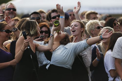 August 16, 2015 - 150816  -  July Talk helps fans with their hydration at Interstellar Rodeo at the Forks Sunday, August 16, 2015. John Woods / Winnipeg Free Press