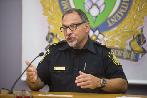 Constable Robert Carver speaks about possible fentanyl-related incidents at the Winnipeg Police Service in Winnipeg on Monday, Aug. 17, 2015.   Mikaela MacKenzie / Winnipeg Free Press