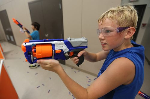 Josh Harder, 12, playing Dartpocalypse. For Dave Sanderson, Saturday, July 25, 2015. (TREVOR HAGAN/WINNIPEG FREE PRESS)