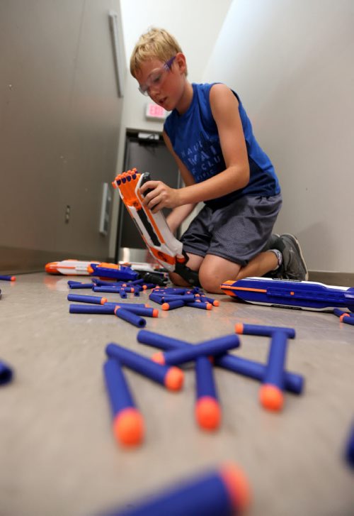 Josh Harder, 12, playing Dartpocalypse. For Dave Sanderson, Saturday, July 25, 2015. (TREVOR HAGAN/WINNIPEG FREE PRESS)