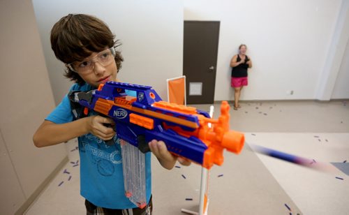 Isaac Taylor, 11, playing Dartpocalypse. For Dave Sanderson, Saturday, July 25, 2015. (TREVOR HAGAN/WINNIPEG FREE PRESS)