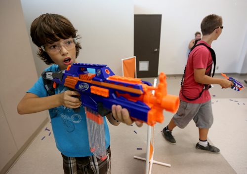 Isaac Taylor, 11, playing Dartpocalypse. For Dave Sanderson, Saturday, July 25, 2015. (TREVOR HAGAN/WINNIPEG FREE PRESS)