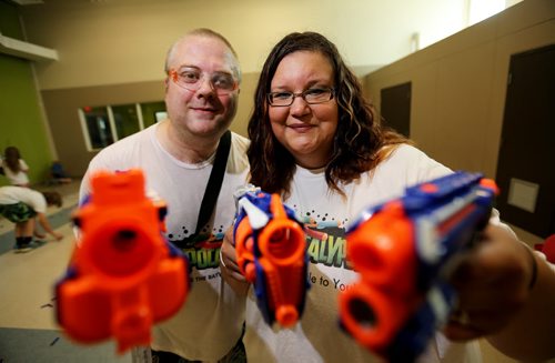 Scott and KeriAnn Stone, owners of Dartpocalypse. For Dave Sanderson, Saturday, July 25, 2015. (TREVOR HAGAN/WINNIPEG FREE PRESS)