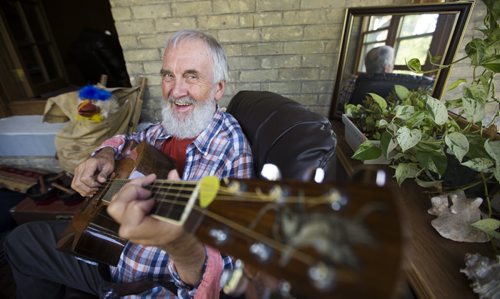 Fred Penner in his apartment in Winnipeg on Tuesday, Aug. 18, 2015.  Penner's show, Fred Penner's Place, debuted 30 years ago this year. Mikaela MacKenzie / Winnipeg Free Press