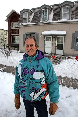 BORIS MINKEVICH / WINNIPEG FREE PRESS  071210 Sel Burrows stands in front of 10 Lorne, a crack house that was shut down.