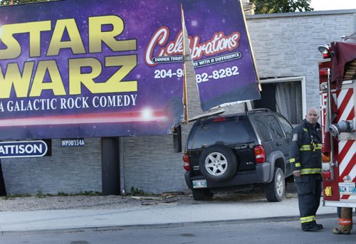 Winnipeg Fire Fighters at the scene on St. Mary's Road at Hull Ave. Tuesday morning after a SUV crashed into the side of the Keratin Care Nail,Skin and Hair salon. The driver was not injured.Wayne Glowacki / Winnipeg Free Press August 18 2015