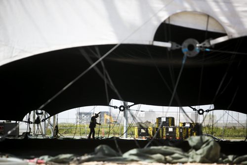 Workers set up the Cavalia big top in Winnipeg on Tuesday, Aug. 18, 2015.   Mikaela MacKenzie / Winnipeg Free Press