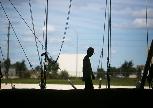 Workers set up the Cavalia big top in Winnipeg on Tuesday, Aug. 18, 2015.   Mikaela MacKenzie / Winnipeg Free Press