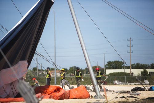 Workers set up the Cavalia big top in Winnipeg on Tuesday, Aug. 18, 2015.   Mikaela MacKenzie / Winnipeg Free Press