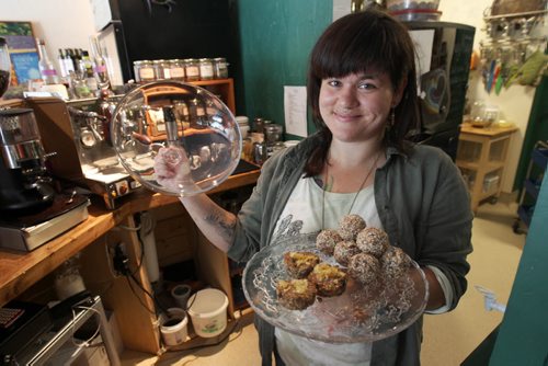 Chad Cornell and Nancy Hall own Hollow Reed Café 875 Corydon Ave. Fresh food from the non-GMO snackery- Jade Oswald holds Schmooze spears and lemon raisen granola bars -See Alexander Paul story- Aug 19, 2015   (JOE BRYKSA / WINNIPEG FREE PRESS)