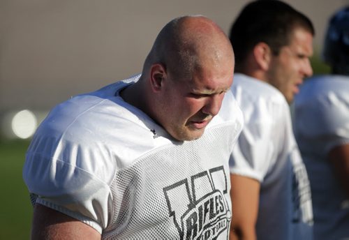 Mason Dick an offensive lineman with the Winnipeg Rifles is back after a season off with a torn ACL, See Scott Billeck's story. August 19, 2015 - (Phil Hossack / Winnipeg Free Press)