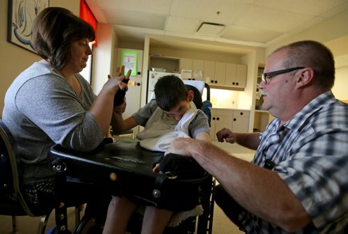 Shelley Doudiet, Gregory Plitnikas and Jerry Plitnikas at St.Amant, Wednesday, August 19, 2015. (TREVOR HAGAN/WINNIPEG FREE PRESS) NOTE: not called st.amant centre anymore. Just st.amant.