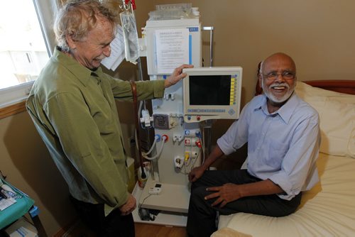 Govt launching a program to reimburse water and electricity costs for patients undergoing home hemodialysis treatment. Right, Mukhtiar Singh gets hemodialysis at home. Left is Mendel Schnitzer, who also get s this machine at home. Photo taken in Singh's home. BORIS MINKEVICH / WINNIPEG FREE PRESS PHOTO August 20, 2015