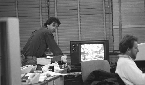 Wayne Glowaki in old Free Press office watching game on TV.  Nov 17, 1990