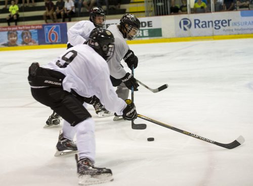 DAVID LIPNOWSKI / WINNIPEG FREE PRESS 150820 August 20, 2015 The 2000 College Summit Win teams play at MTS Iceplex Thursday August 20, 2015. Mark Chipman spoke to the youth about planning for their future at the College Hockey Inc. Summit.