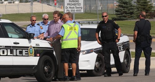 The Canada Post sorting facility on Wellington near James A Richardson International Airport has been evacuated by fire and police as they investigate a suspicious package found Breaking News- Aug 21, 2015   (JOE BRYKSA / WINNIPEG FREE PRESS)