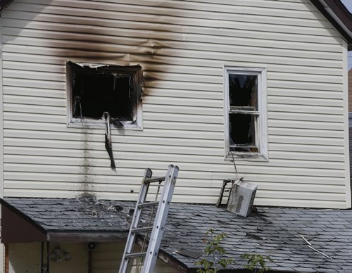 The back of the house at 257 Dorothy St. near Alexander Ave. Friday after reports of smoke and flames coming from the second floor.   Wayne Glowacki / Winnipeg Free Press August 21 2015