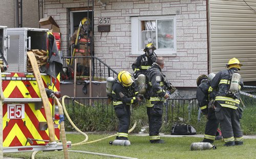 Winnipeg Fire Fighters extinguished a fire in a house at 257 Dorothy St. near Alexander Ave. Friday after reports of smoke and flames coming from the second floor.   Wayne Glowacki / Winnipeg Free Press August 21 2015