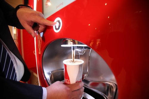 Kellen Jasper, GM of the Grant Park Theatre  shows off the new Freestyle drink machines now available at the renovated cinema.   One of several photos for this story illustrating its upgrades. See Randall King's story.  Aug 21, 2015 Ruth Bonneville / Winnipeg Free Press